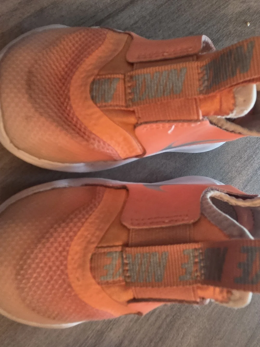 Nike Kids Orange Slip-On Sneakers with Grey Swoosh